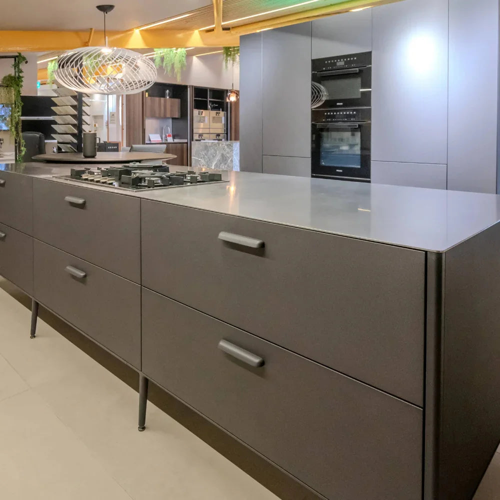 Modern kitchen with grey cabinets and countertop