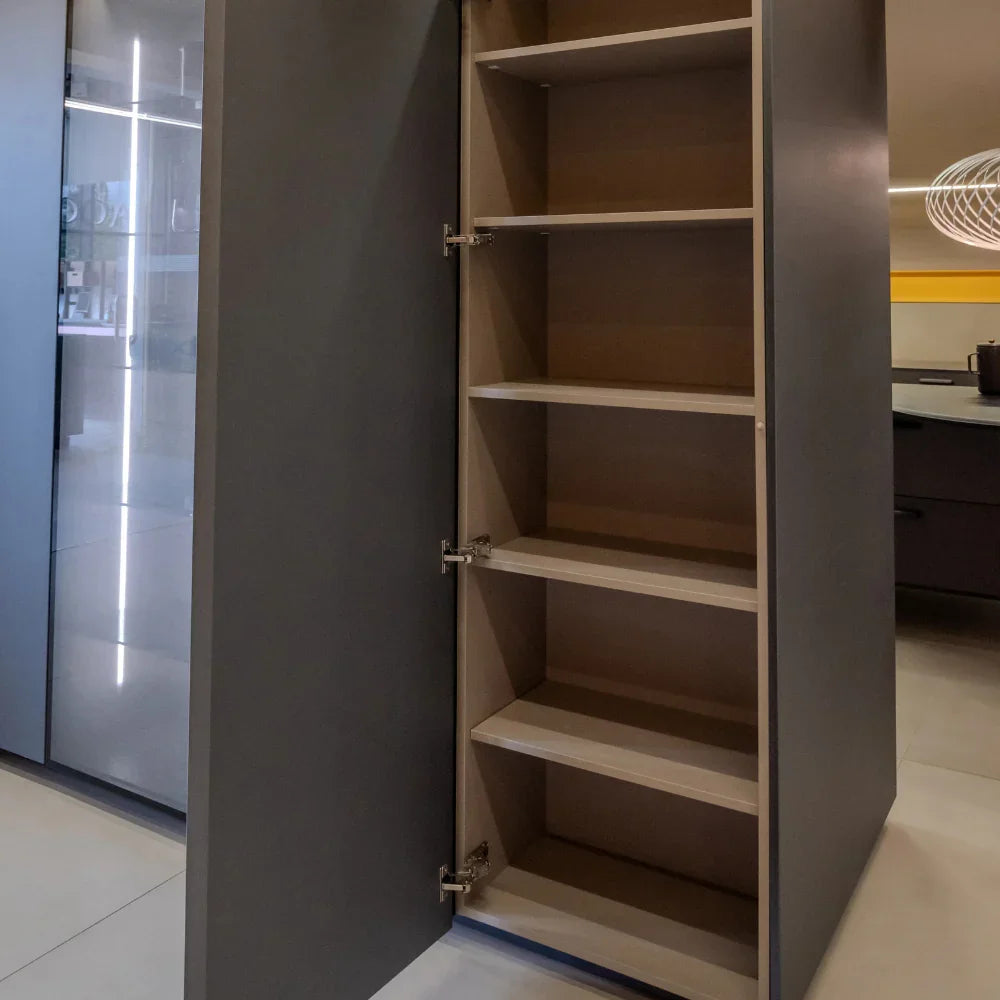 Open kitchen cabinet with shelves in a modern kitchen setting