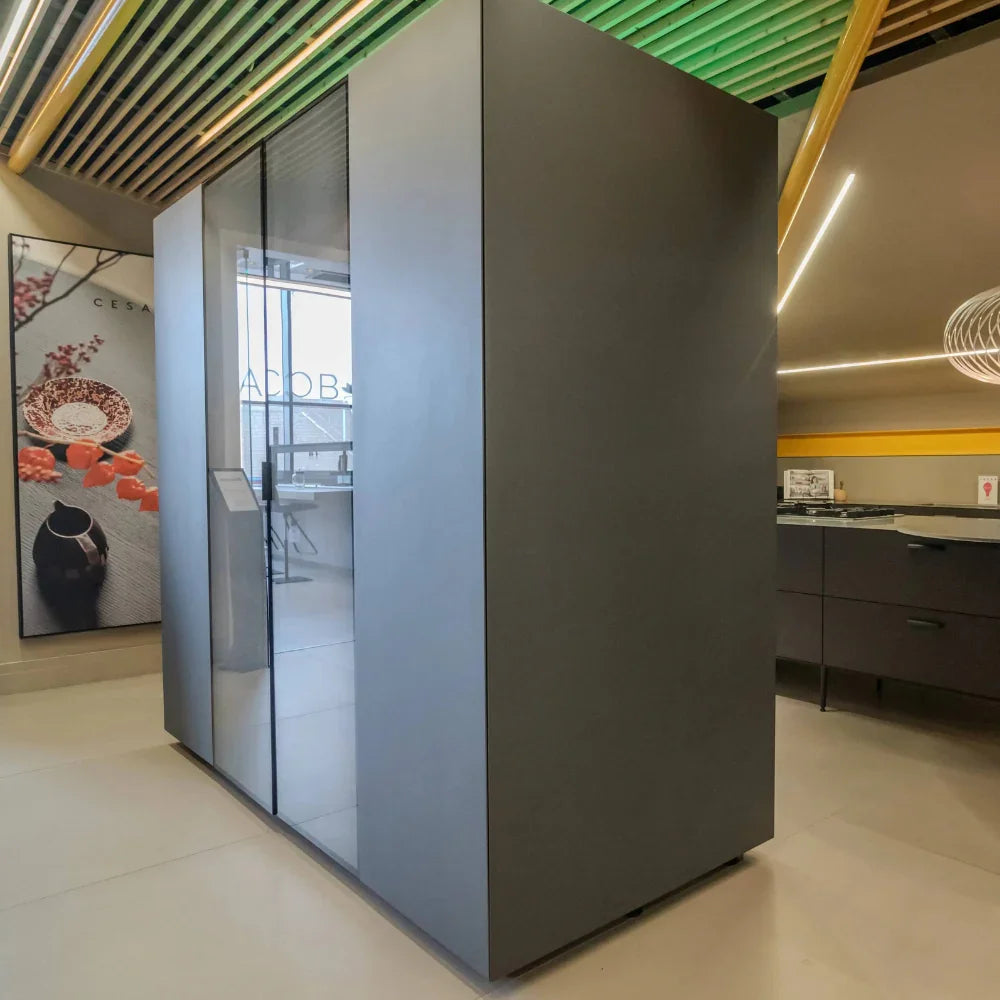 Modern kitchen interior with a large grey storage unit.