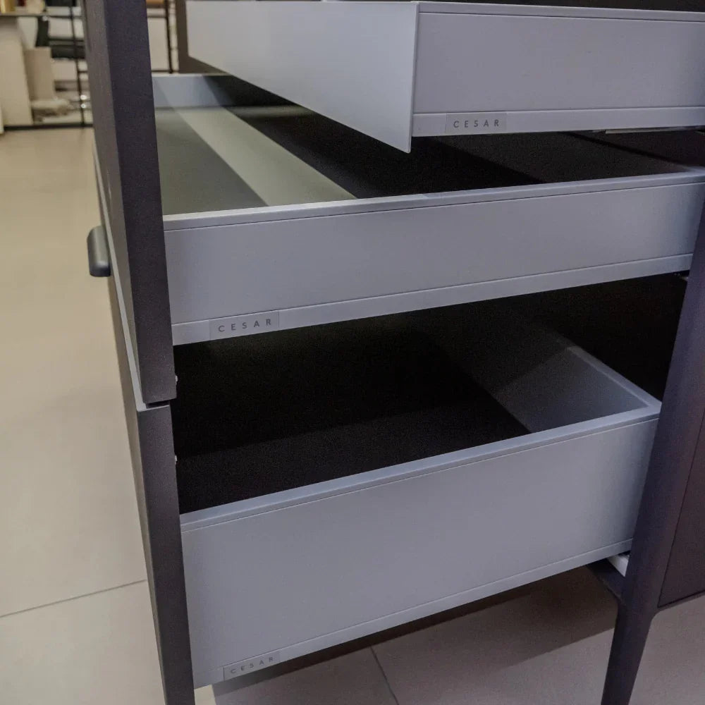Metal drawers with 'Cesar' branding on a light background