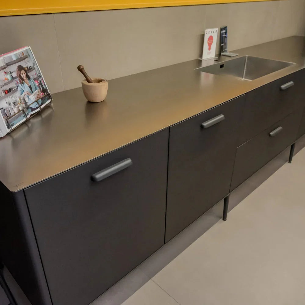 Modern kitchen counter with sink and cabinets