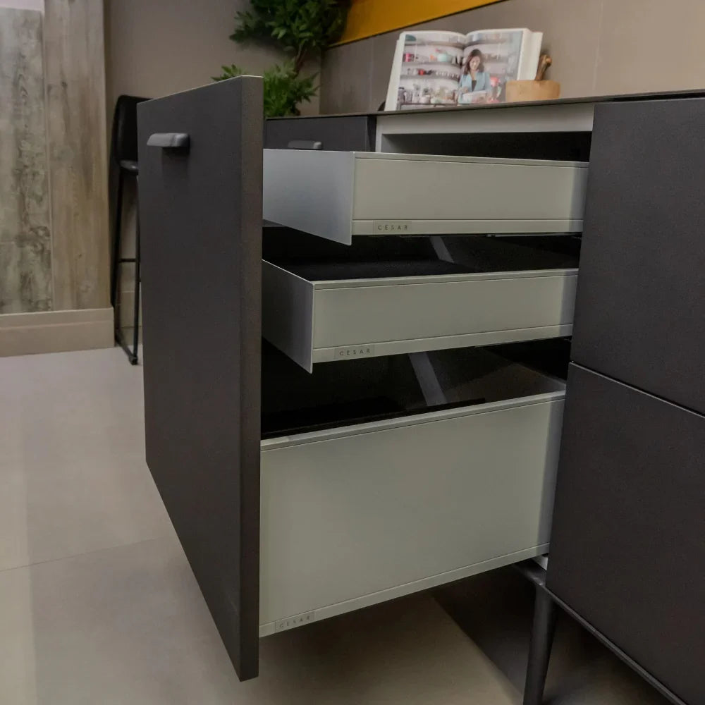 Modern storage unit with open drawers in a room setting