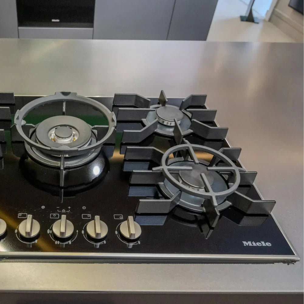 Miele gas stove on a kitchen counter