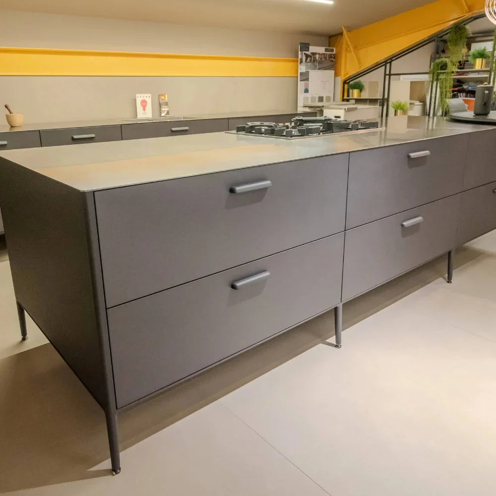 Modern kitchen with grey island and yellow accents