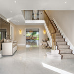white polished gloss porcelain tile in a hall way