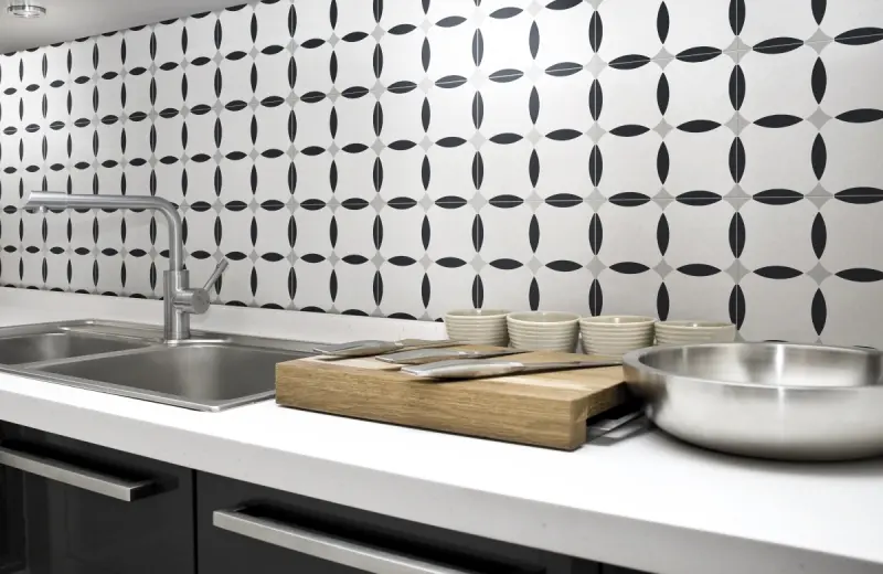 Black and white patterned tiles in a kitchen