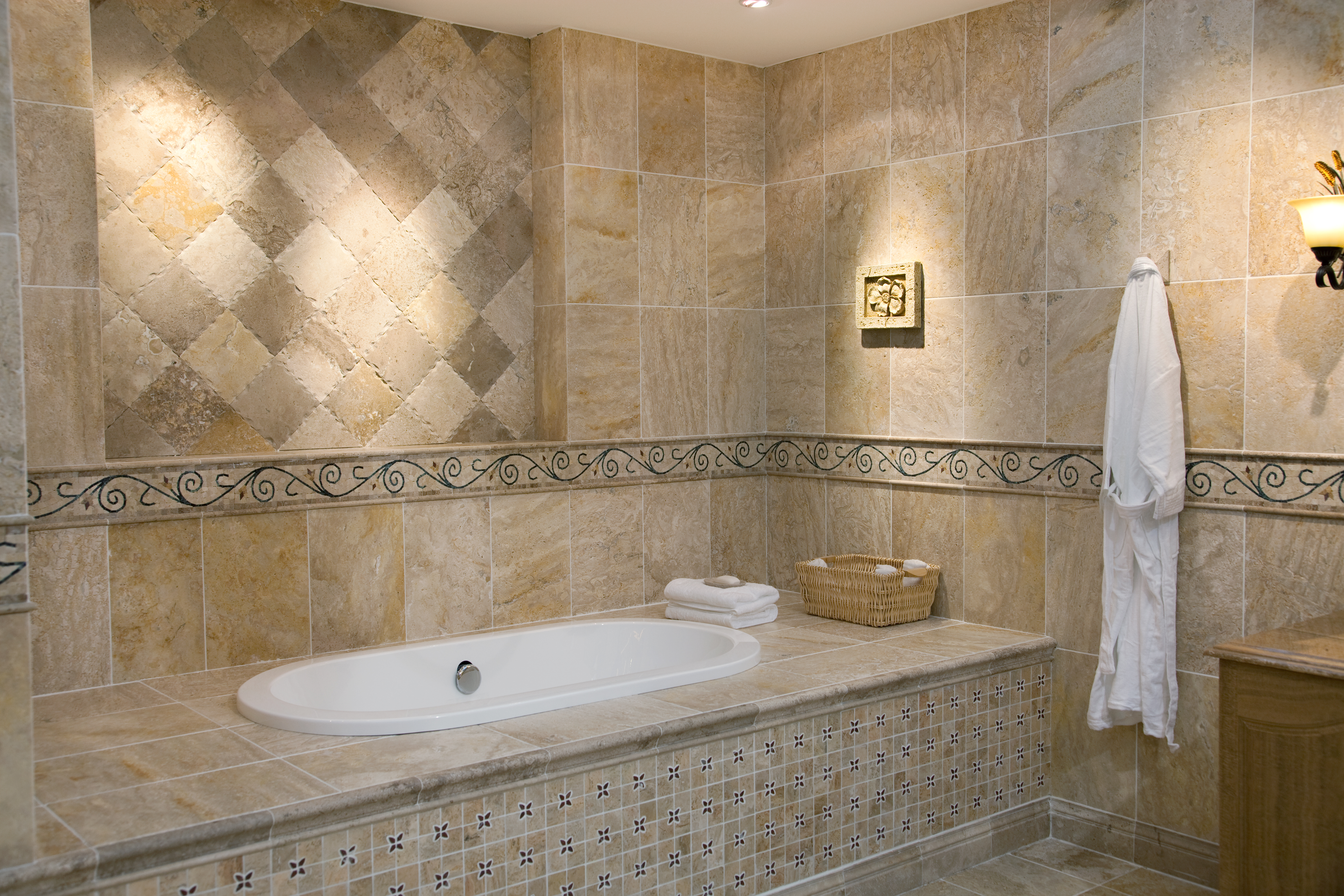 Bathroom setting with assorted traditional tiled areas