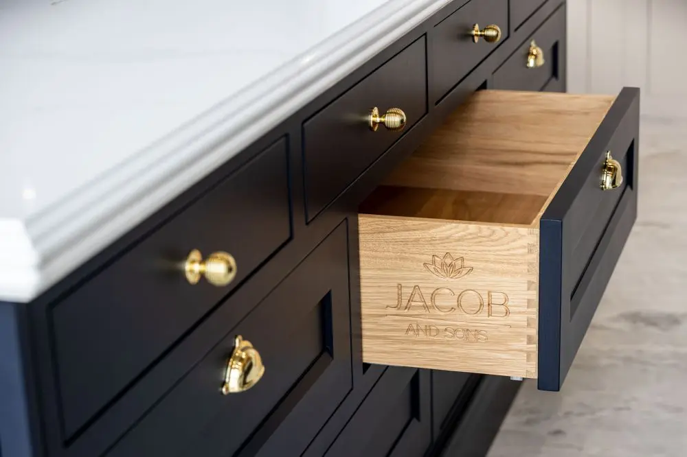 Jacob and Sons detailing on wooden drawer