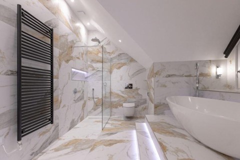 bathroom with tiled floor and walls