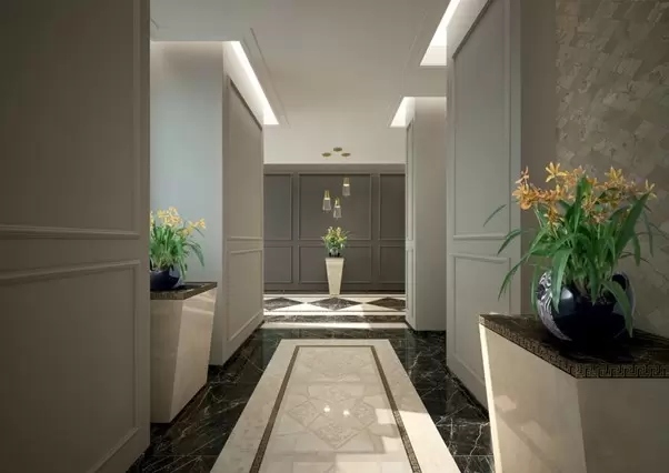 Elegant and grand hallway with Versace floor tiles