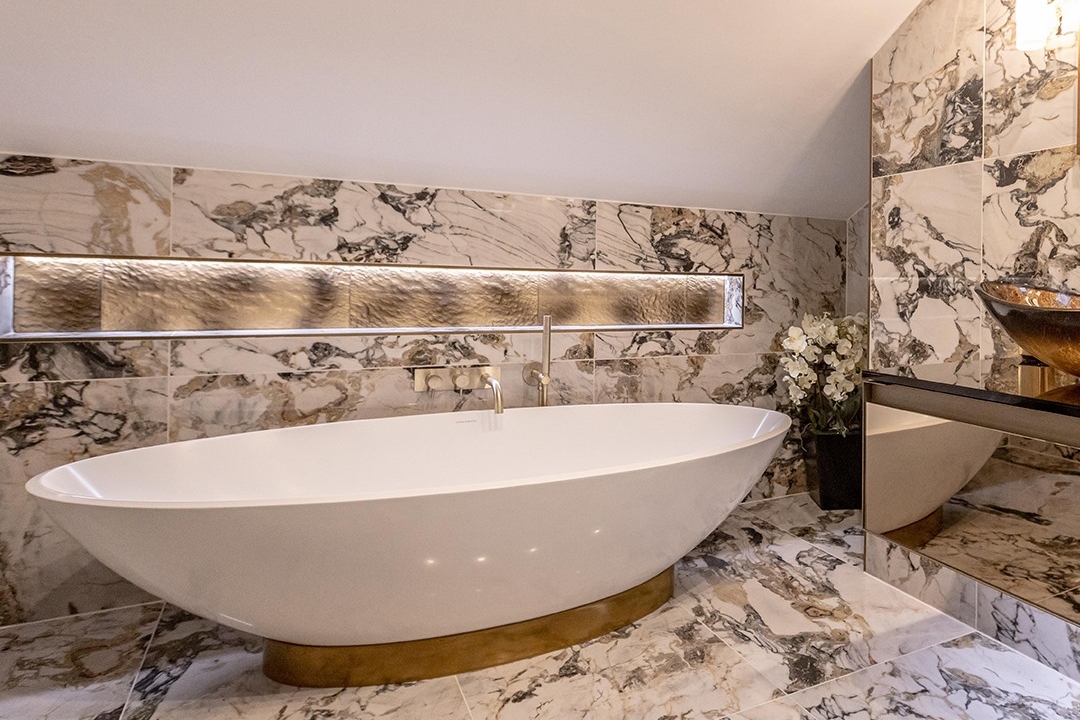 Luxurious bathroom with marble floor and wall tiles
