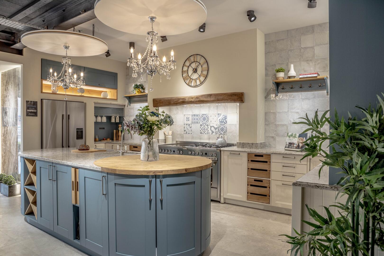 Blue, white, and grey country house kitchen with wooden details in Roccia's Preston kitchen showroom