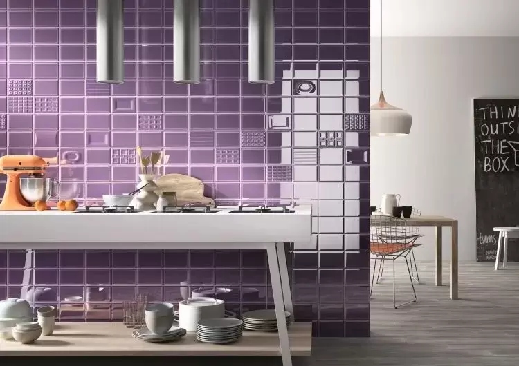 Modern kitchen with white fittings and purple subway tiles