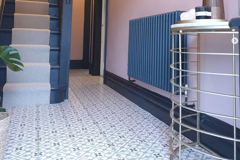 Impressive hallway with modern interior and Victorian floor tiles