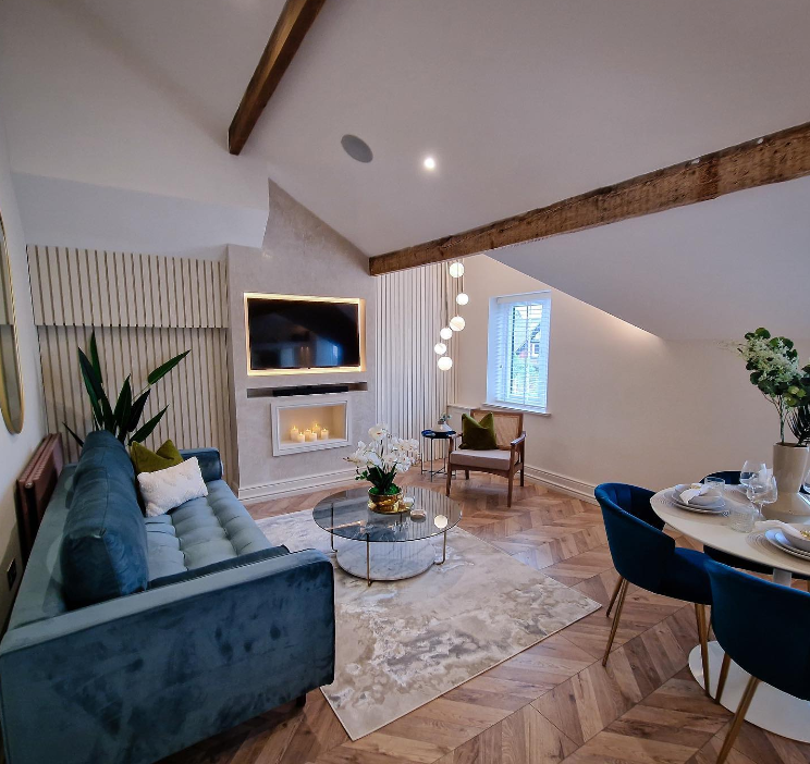 Beautiful modern wooden tiles in a contemporary farmhouse style home with blue soft furnishings 