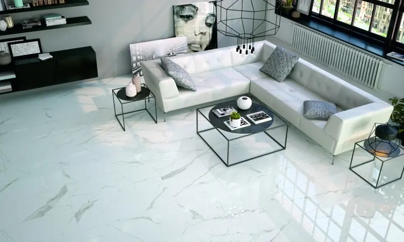 Modern white and grey marble large format tiles in a contemporary living area