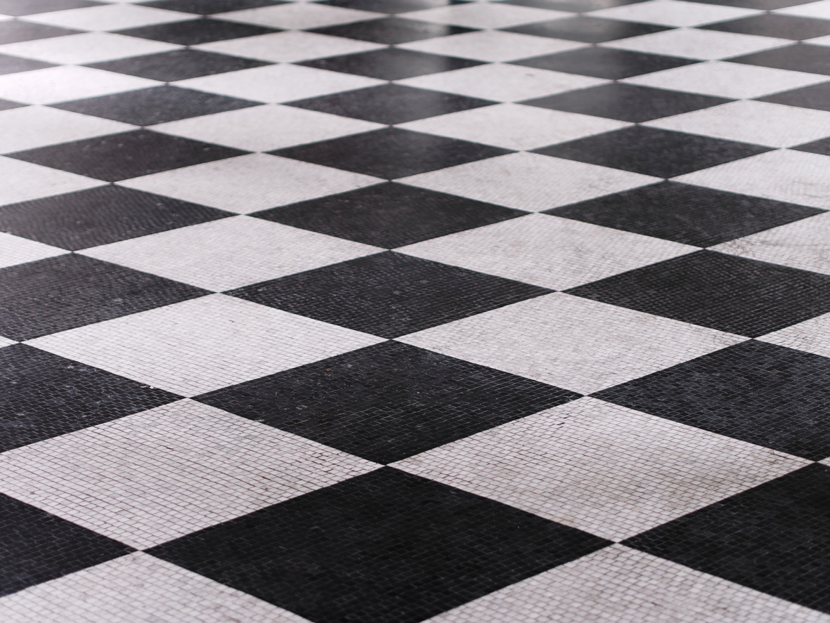 Black and white checked kitchen floor tiles