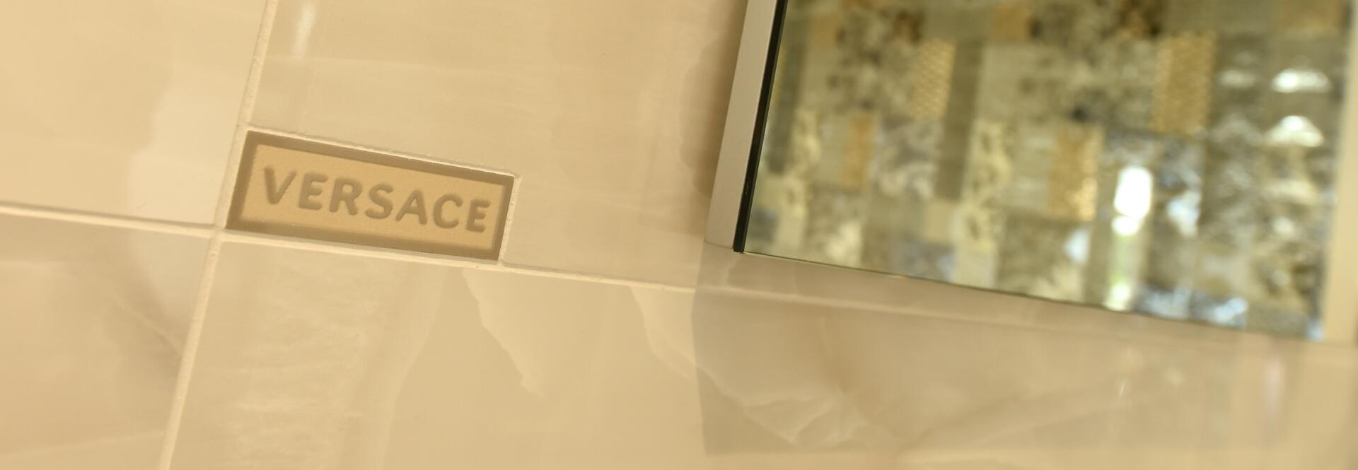 Versace tiles on bathroom wall