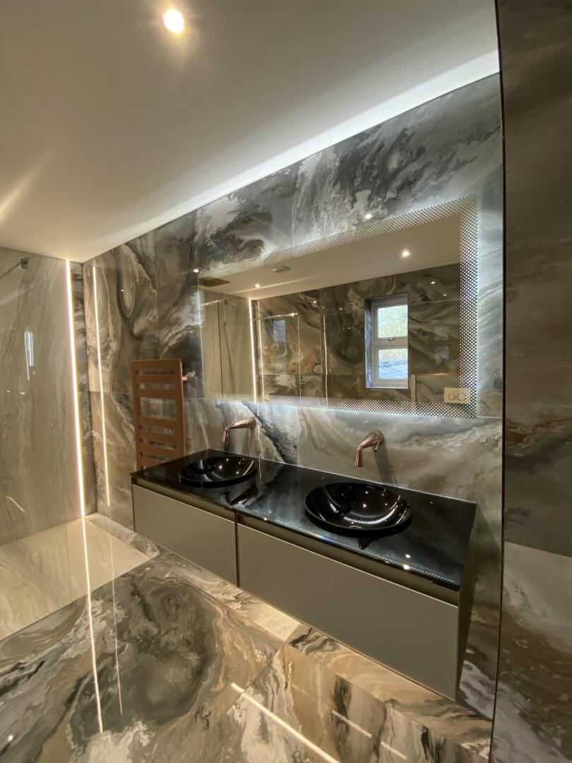 Stunning marble Gessi bathroom design