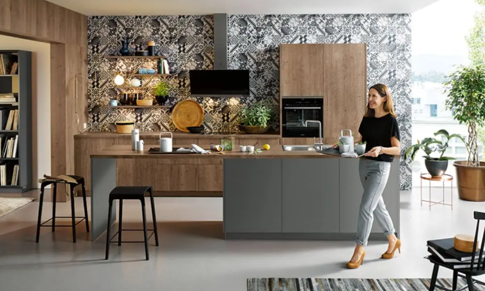 Woman walking through stunning maximalist kitchen