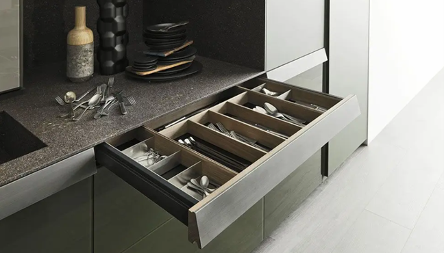 open kitchen drawer with cutlery