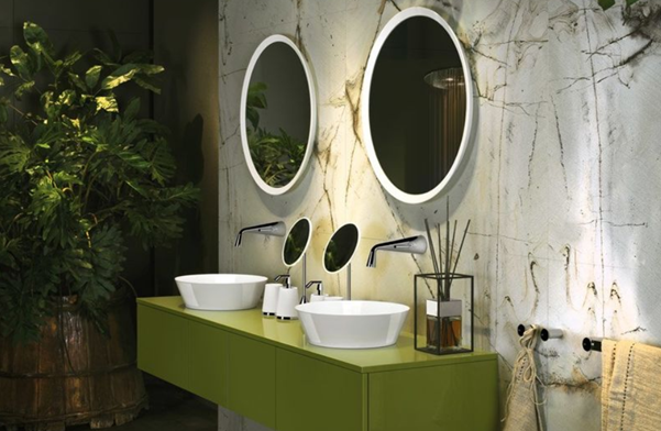 green bathroom his and hers sink with marble tiles and plants