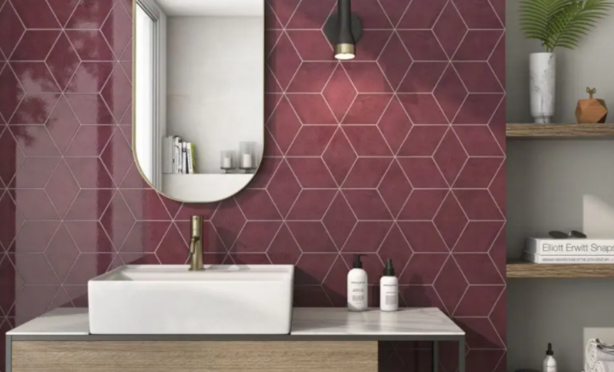 pink hexagonal tiles on a feature wall in a bathroom